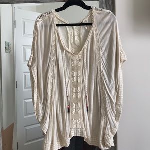 Cream tunic with cute detailing